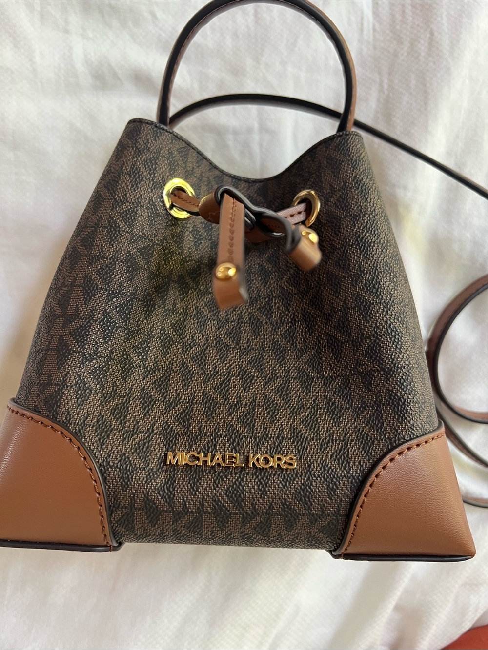 Michael Kors Brown and Tan Mini Drawstring Bucket Bag